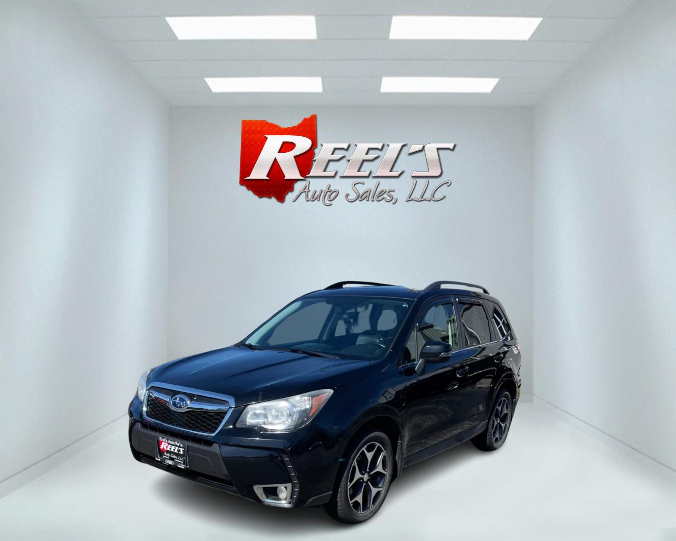 2014 Black /Black Subaru Forester 2.0XT Touring (JF2SJGMC4EH) with an 2.0L H4 SOHC 16V TURBO engine, Automatic transmission, located at 547 E. Main St., Orwell, OH, 44076, (440) 437-5893, 41.535435, -80.847855 - This 2014 Subaru Forester 2.0XT Touring is a well-equipped compact SUV featuring a powerful 2.0L turbocharged engine matched with a continuously variable transmission (CVT) for a blend of performance and efficiency. It boasts a range of high-end amenities, including heated seats, X-Mode for enhanced - Photo#0